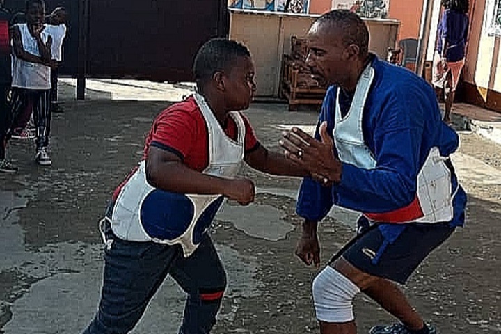 Learner practicing taekwando